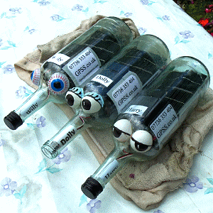 three bottles, sealed and ready