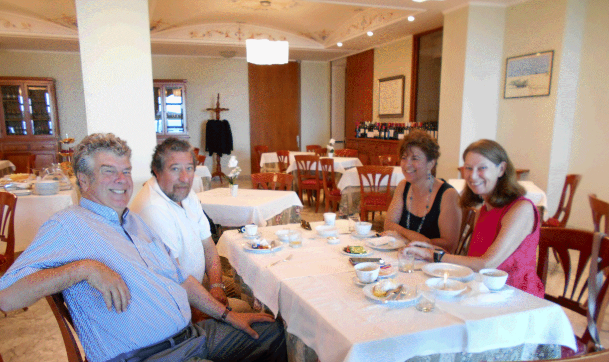 Robin, Enrico, Matide, and June at breakfast in Capo d'Orlando